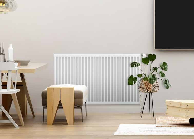 Witte paneelradiator T22 in een lichte woonkamer – paneelradiatoren Oostende